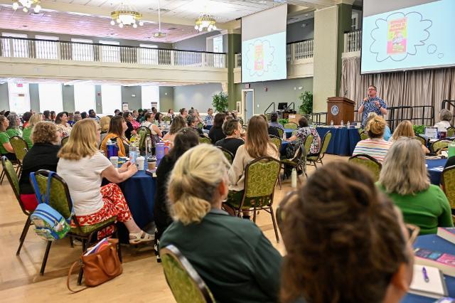 Participants listening to keynote speaker John Schu