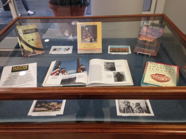 Native-American books in the Greenwood Library display case.